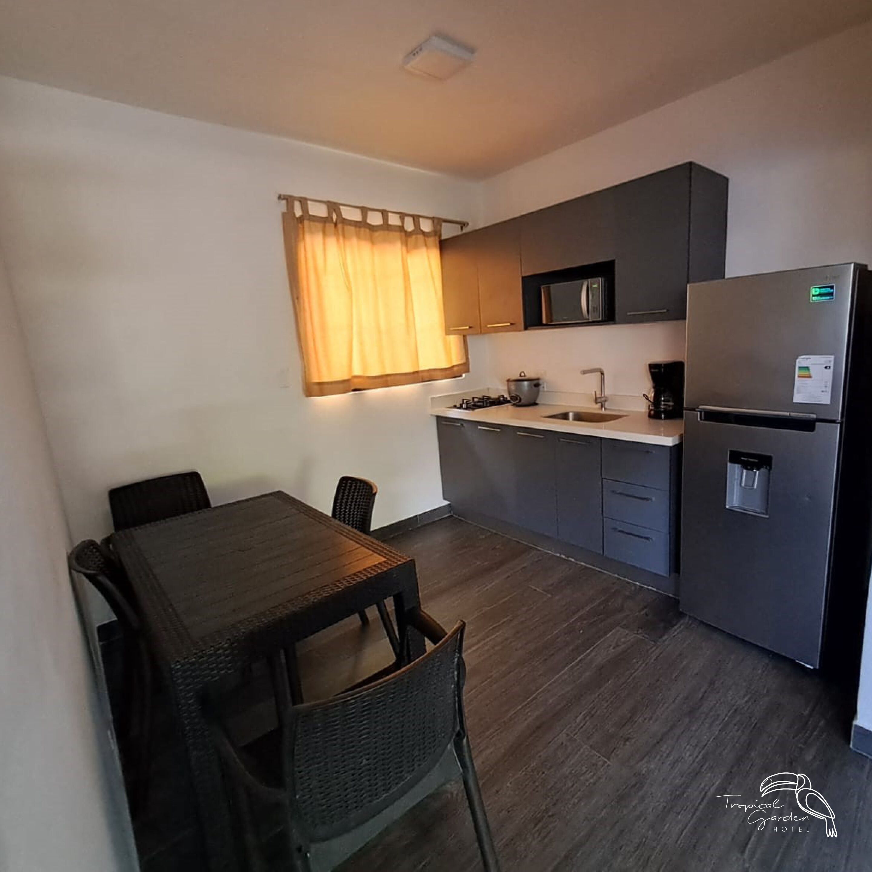 family apartment, multiple beds, non smoking, pool view | private kitchen | full-sized fridge, microwave, coffee/tea maker, cookware/dishes/utensils