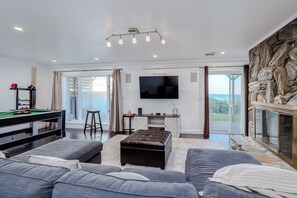 Smart TV, fireplace, ping pong, books