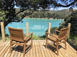 Property grounds - Stylish waterfront retreat - dramatic 180 degree views! (Anzac Bay)