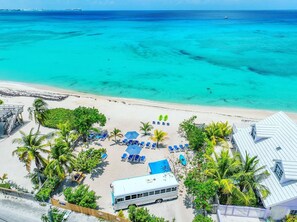 On the beach, sun-loungers, beach towels