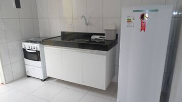 Fridge, stovetop, cookware/dishes/utensils