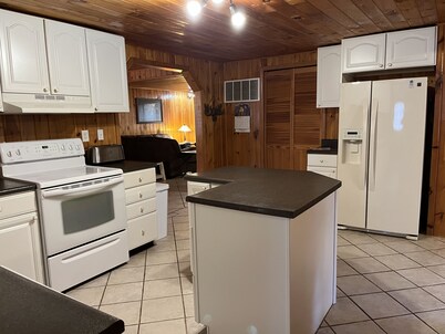 Hot tub!! Fishing, canoeing, biking, swimming, hiking, skiing in Wellston Mi.