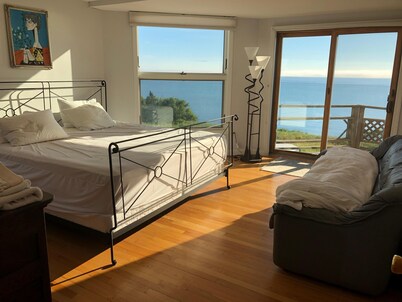 Contemporary beach house on dune directly on Cape Cod Bay