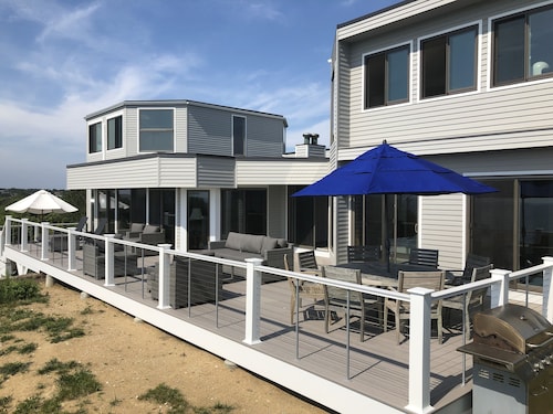 Contemporary beach house on dune directly on Cape Cod Bay