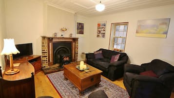 Smart TV, DVD player, table football, books