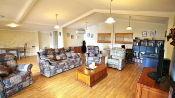 Smart TV, DVD player, table football, books