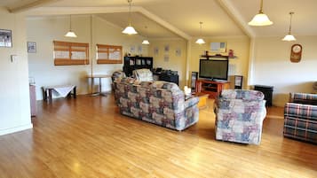 Smart TV, DVD player, table football, books