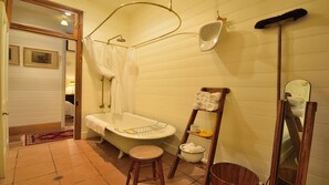 Combined shower/bathtub, hair dryer, towels, soap