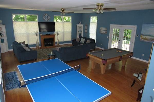 Multipurpose Room, Over Sized Windows, Fire place, 60" TV, Tennis & Pool Tables