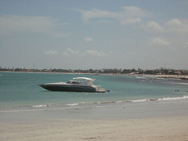 On the beach, sun loungers