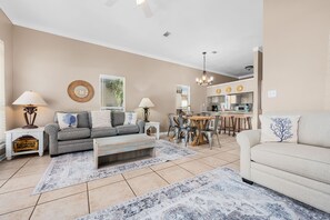 Living room with sleeper sofas (queen and twin) and eat in kitchen 