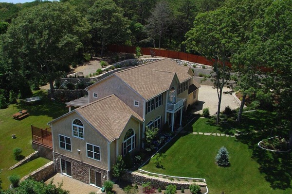 Beautifully Landscaped with Pond on property just 2 minutes away!