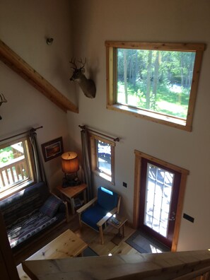 Flat-screen TV, DVD player, table football, books - Sidell's Sturgeon River Log Cabin - Bonfire Pit, WiFi, Biking Trails, Rafting (Indian River)