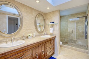 Combined shower/tub, hair dryer, towels, soap