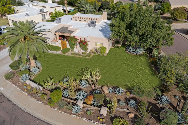 Corner lot. Ranch style with a sunken living room. 2,200 sq ft of living space.
