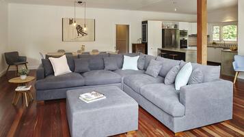 Smart TV, fireplace, table football, books