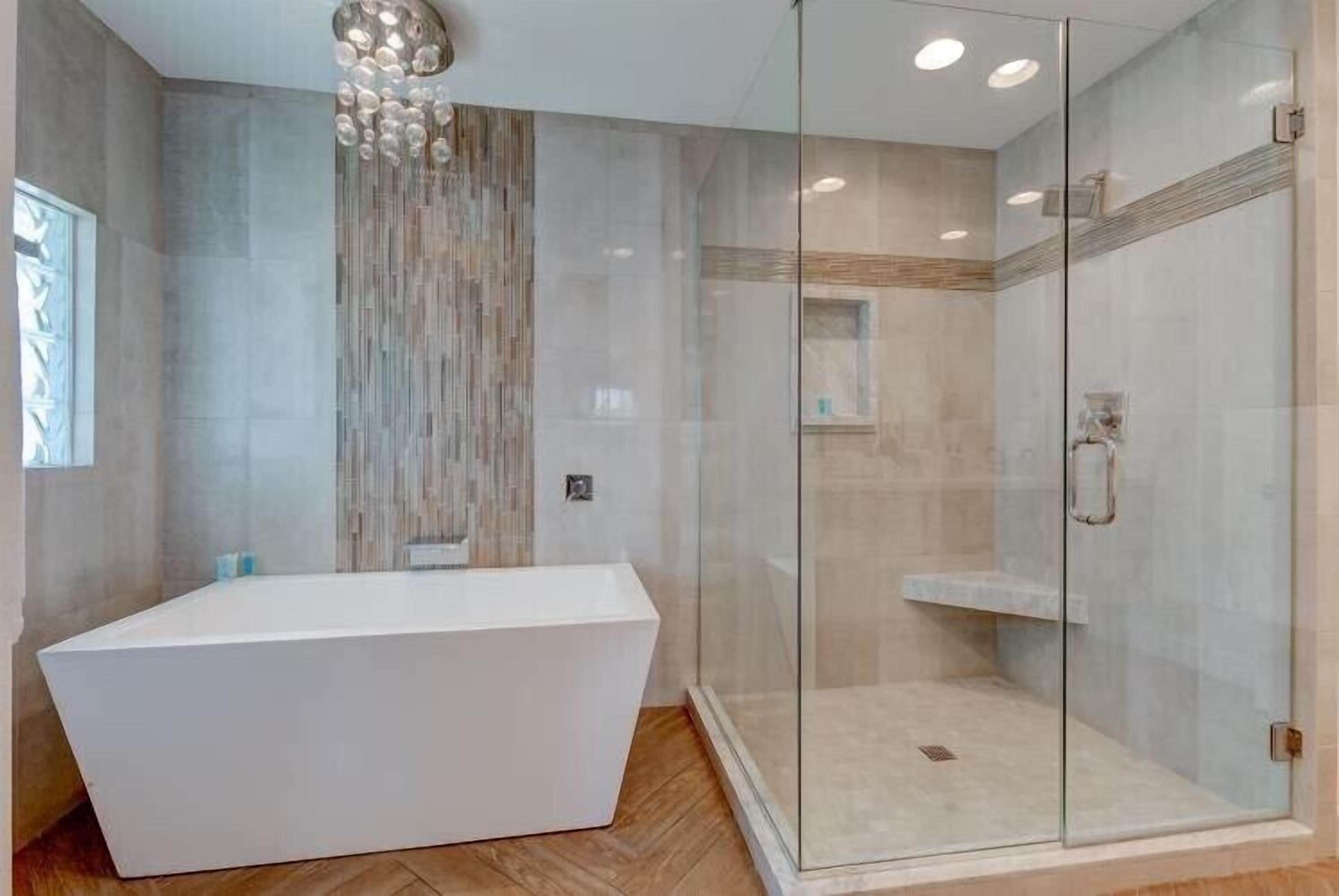Combined shower/bathtub, hair dryer, towels, soap