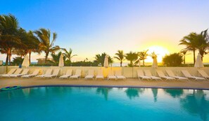 Outdoor pool, a heated pool - Private Beachfront Condominium with Breathtaking Views and Resort Access (Sunny Isles Beach)