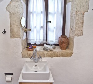 Bathtub, hair dryer, towels, soap