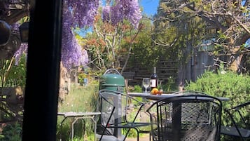 Sit and enjoy the serene surroundings in this peaceful outdoor seating area.