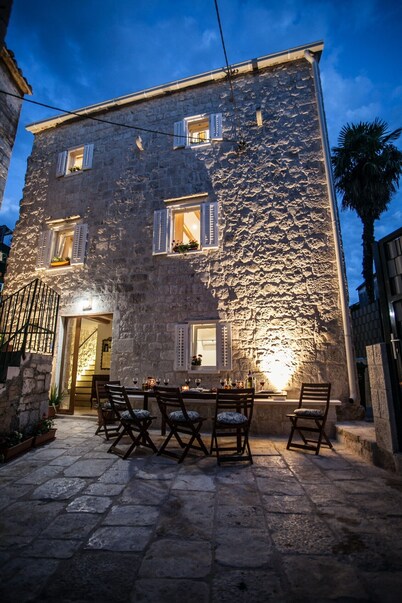 Smooth Marble and Rustic Stone at a Ciovo Island Townhouse