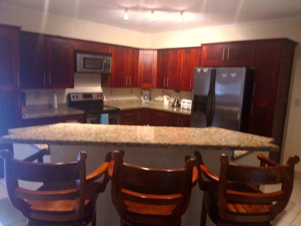 Microwave, dishwasher, coffee/tea maker, cookware/dishes/utensils