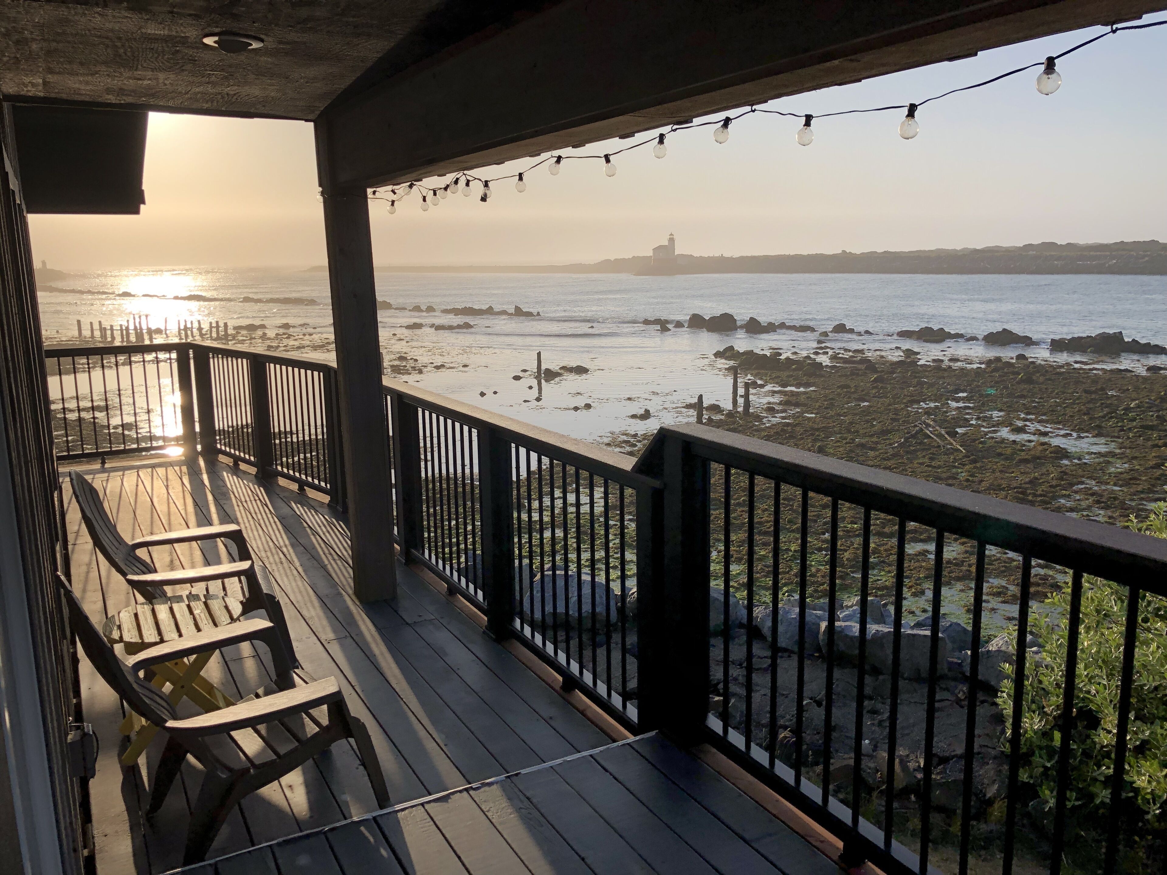 North deck facing NW during sunset. Also low tide lighthouse in the distance