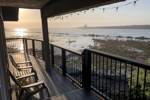 North deck facing NW during sunset. Also low tide lighthouse in the distance