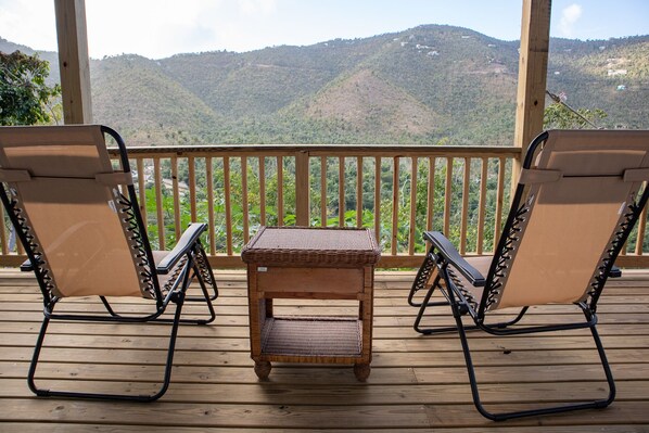 Property grounds - Views over the Valley. Apartment in two story cement house with a 45 foot porch! (St John)