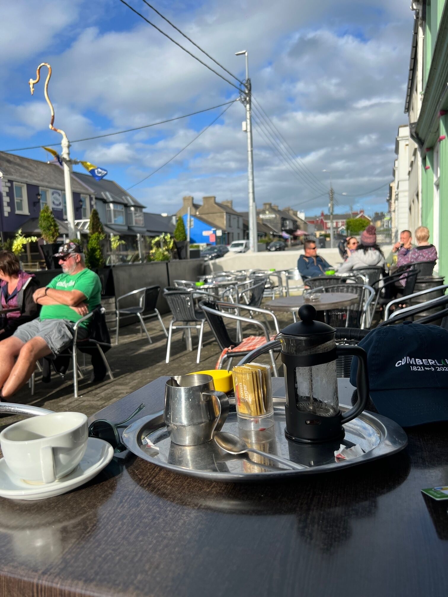 A sunny day for coffee on O'Curry Street