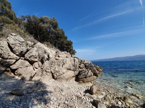 Espreguiçadeiras, toalhas de praia