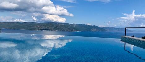 Outdoor pool, sun loungers