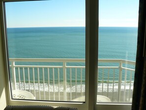 Enjoy the serene ocean views from this balcony.