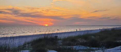 On the beach, sun-loungers, beach towels