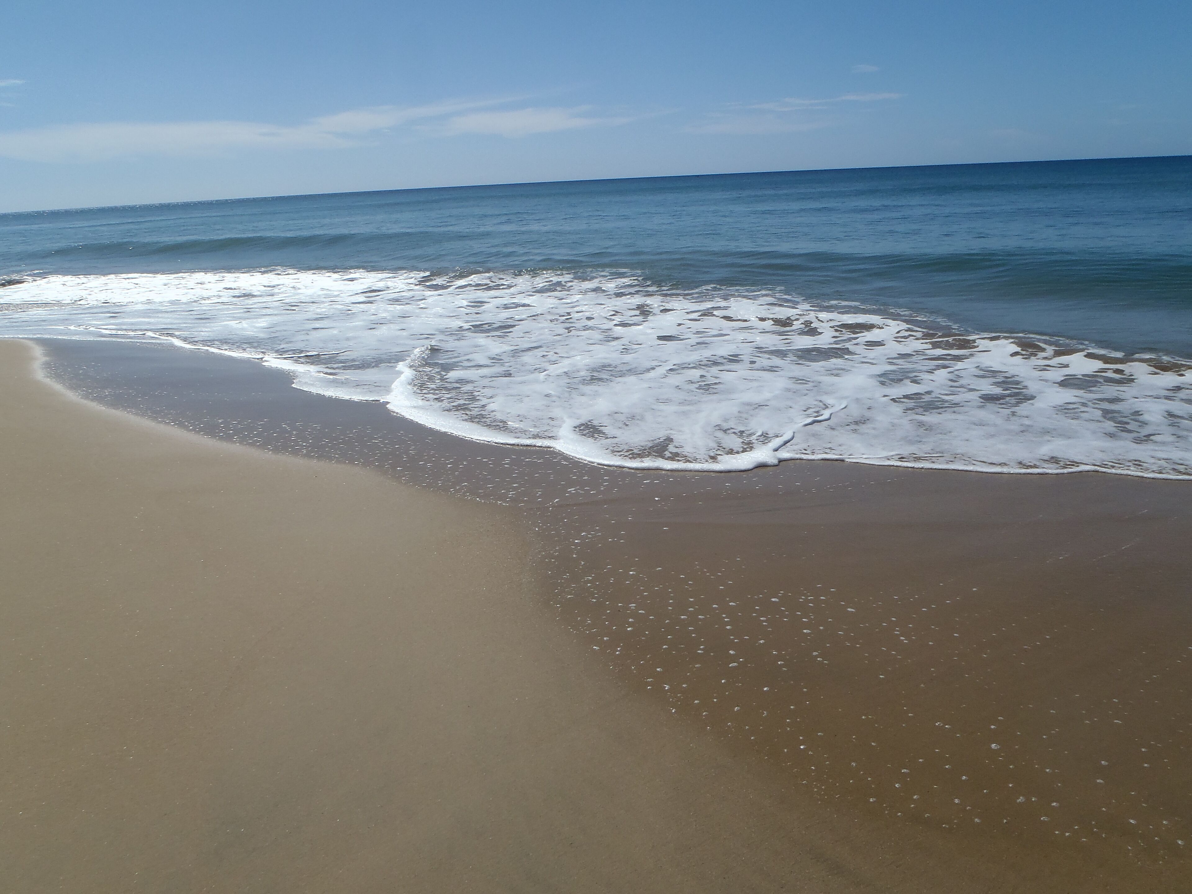 On the beach, beach towels