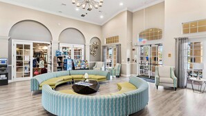 A spacious lobby with a central seating area, multiple doors leading to different sections, and a chandelier. - Presidential Suite 2100 sq-ft,  4  Bedroom  setup, Disney/Universal/Sea IS (Orlando)