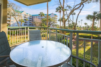 The covered balcony overlooks the Windsor II garden and has limited ocean views.