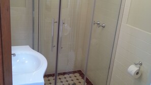 Bathtub, hair dryer, towels, soap