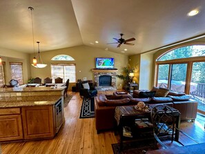 Smart TV, fireplace, books, stereo