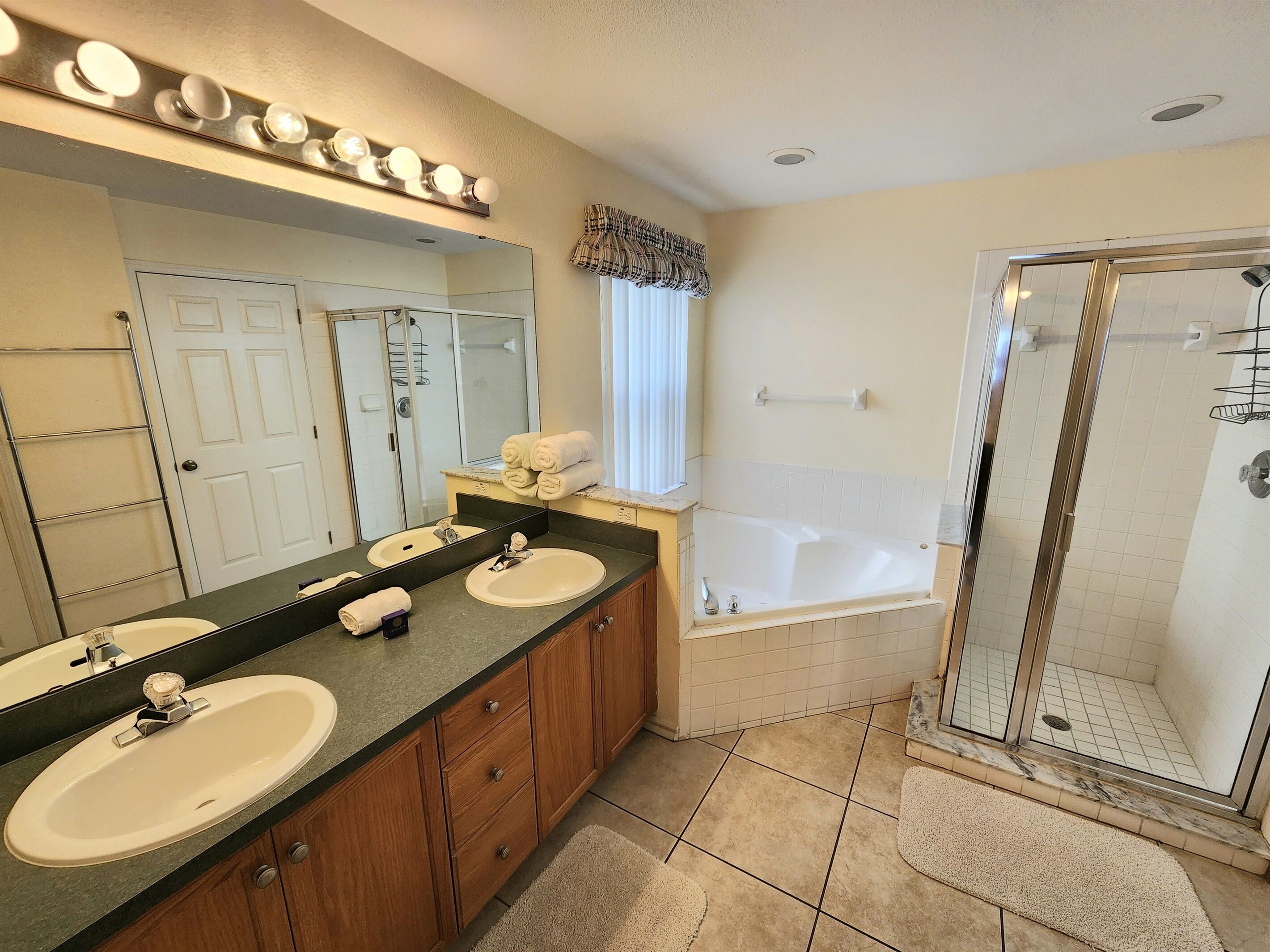 Master Bathroom, double sinks, walk in shower and soaker tub