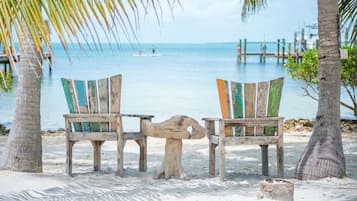 On the beach, sun-loungers, beach towels