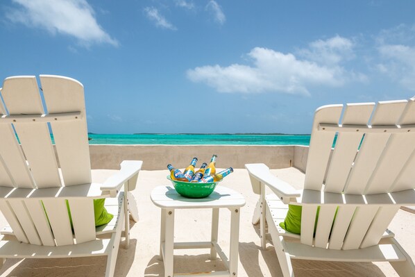 On the beach, sun-loungers, beach towels