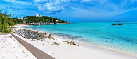 On the beach, sun loungers, beach towels