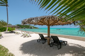 On the beach, sun-loungers, beach towels