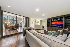 Smart TV, fireplace, DVD player, foosball
