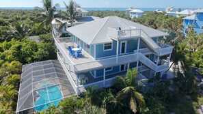 Exterior - Captivation - Sunrise-to-sunset views–walk to beach– 2 golf carts, bikes, pool (Captiva)