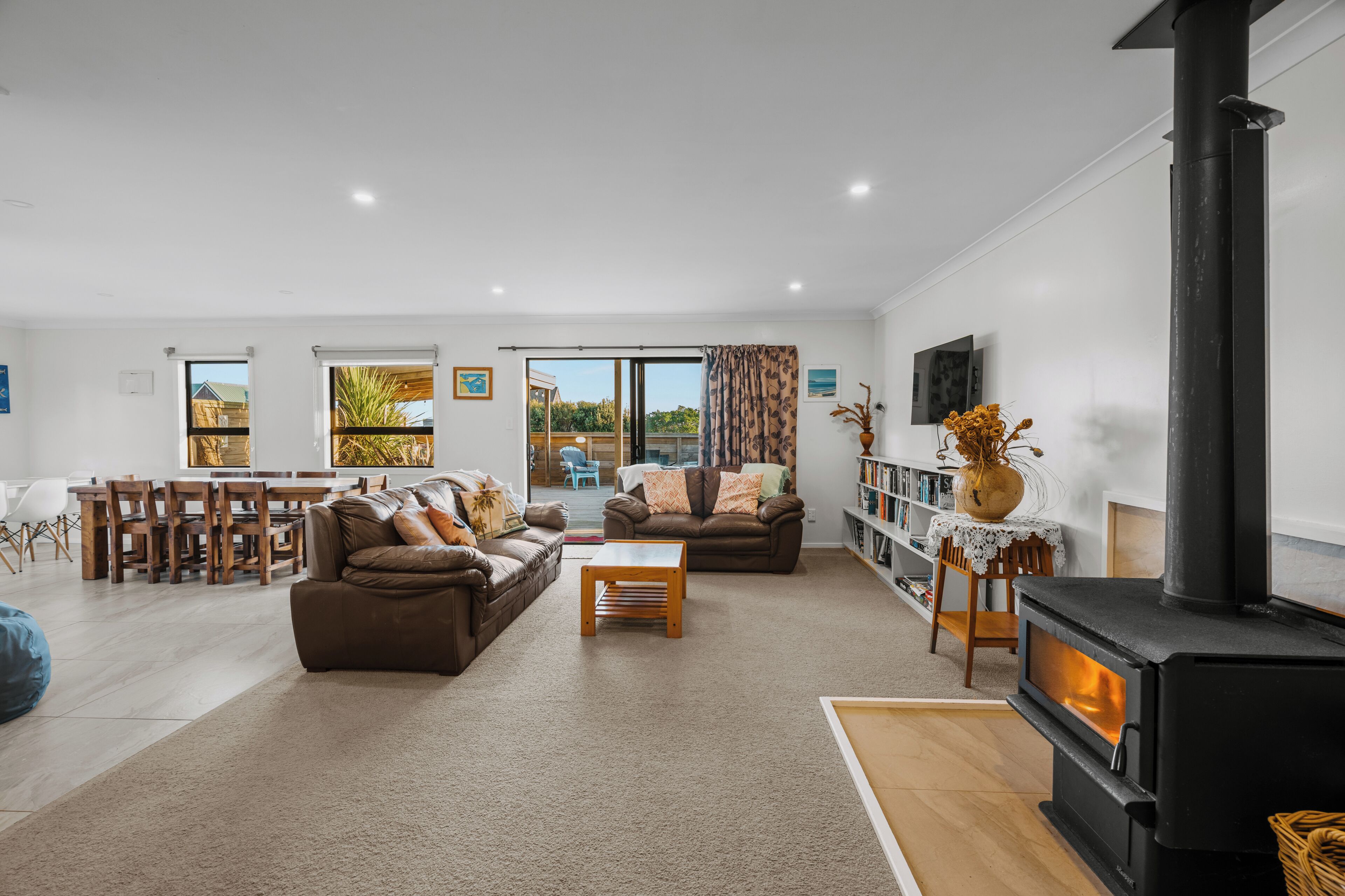 Smart TV, fireplace, table football, books