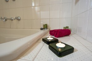 Combined shower/tub, jetted tub, hair dryer