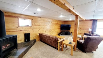 Smart TV, fireplace, DVD player, foosball