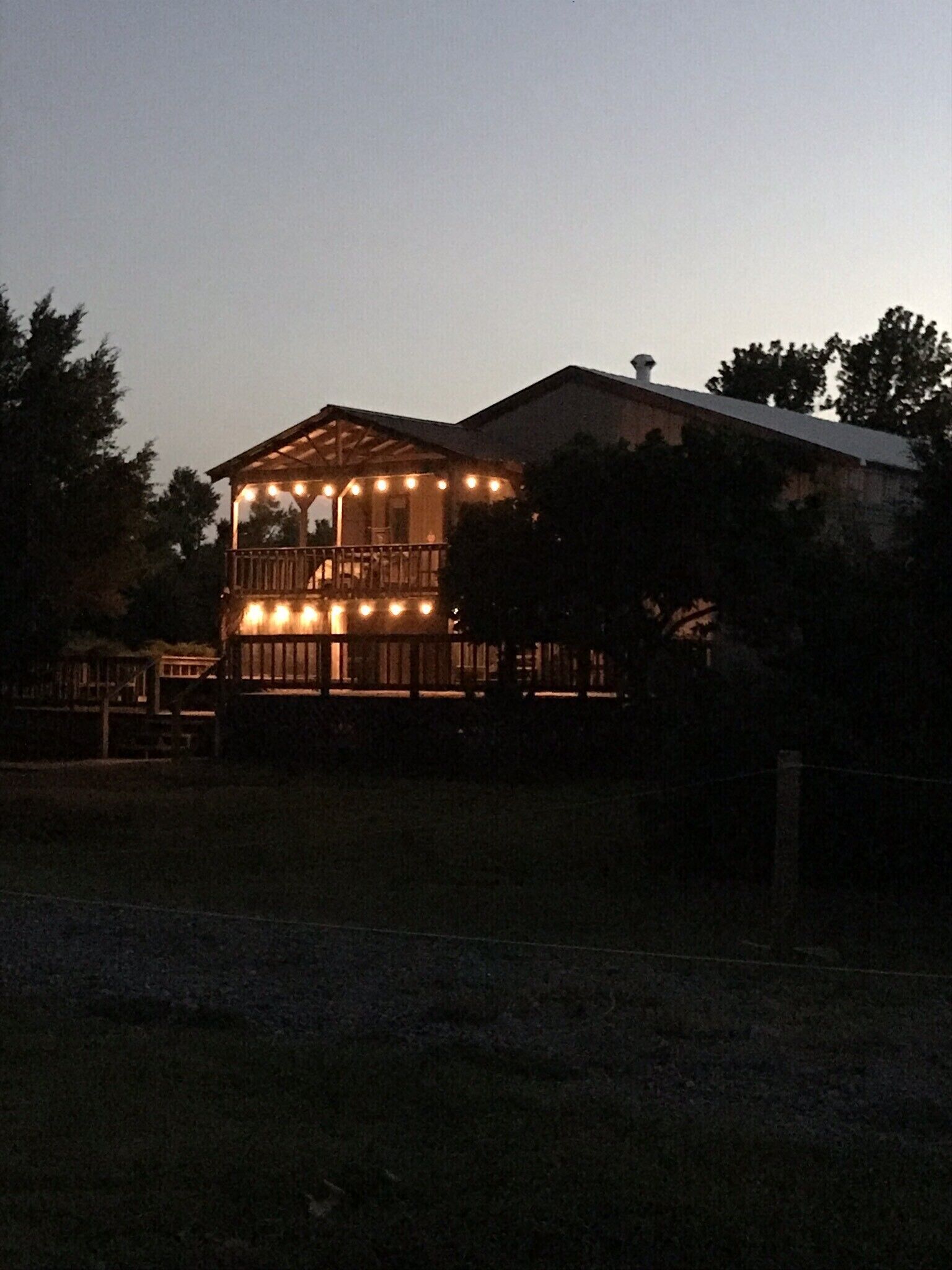 Enjoy our loft with a private hot tub overlooking the vineyard and pond. 